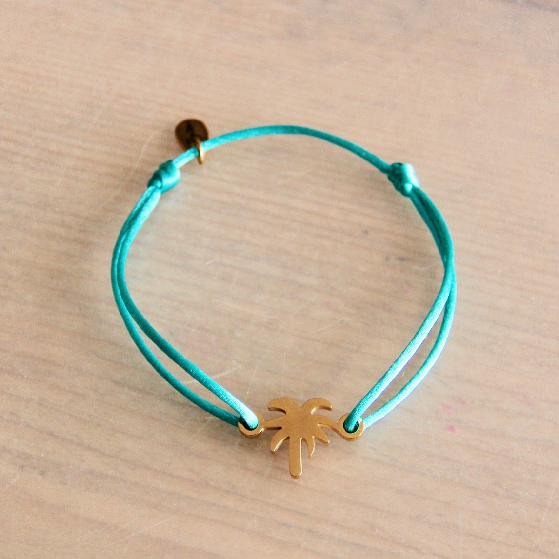 Satijnen armband met palmboom – groen/goud