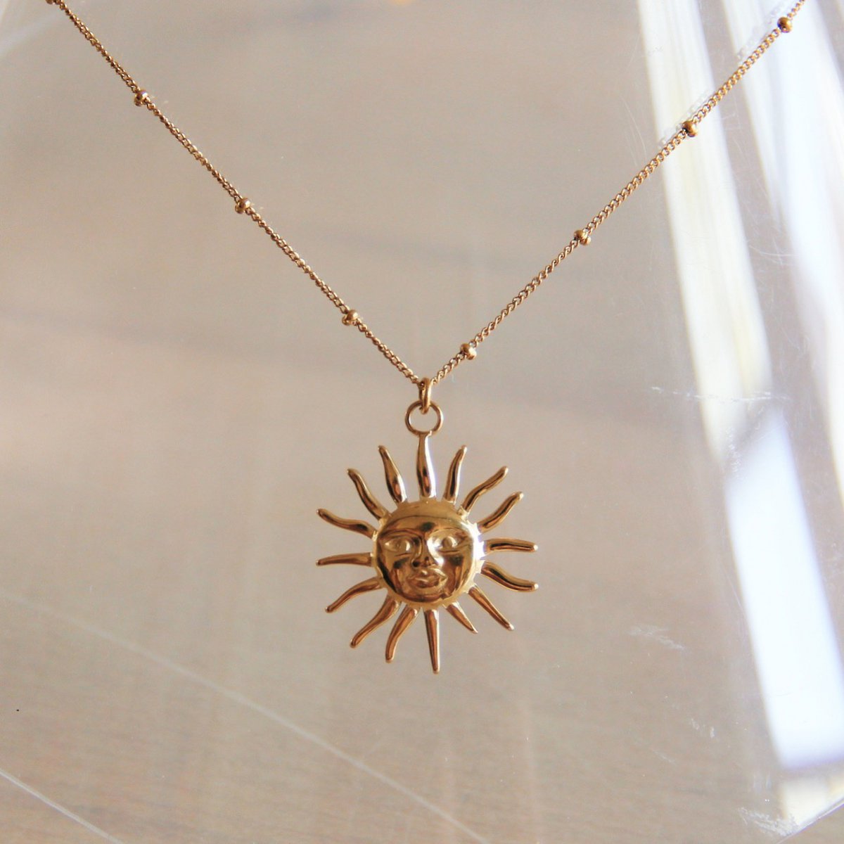 RVS fijne ketting met bolletjes met XL zon - goud